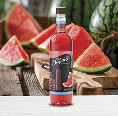 DaVinci Gourmet Sugar-Free Watermelon Syrup dispensing bottle demonstrates easy mixing.