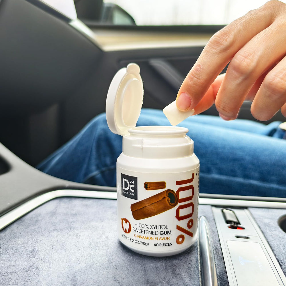 DC24 Daily Care portable bottle in handbag for on-the-go freshness.