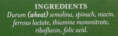 De Cecco Organic Penne Rigate plated with sauce and herbs, appetizing ready-to-serve