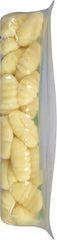 Gnocchi plated with a rich sauce, ready to serve.