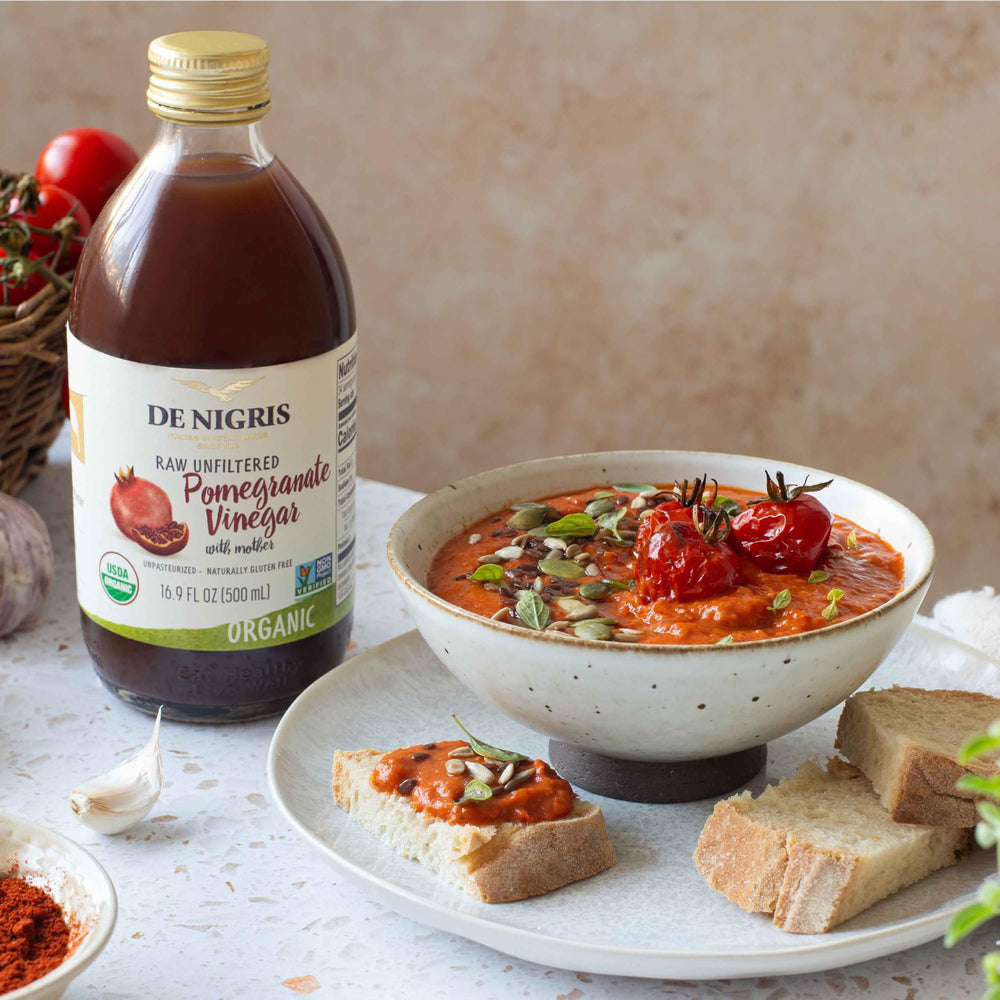 Close-up of De Nigris bottle highlighting polyphenols from pomegranate