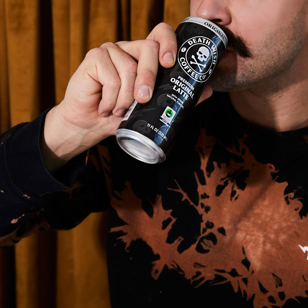 Death Wish Coffee dark roast latte with milk offers a smooth, strong caffeine experience.