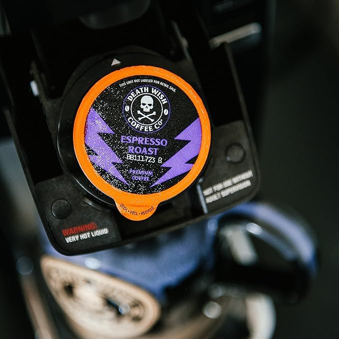 Death Wish Coffee Espresso Roast Pods releasing steam—strong flavor delivery
