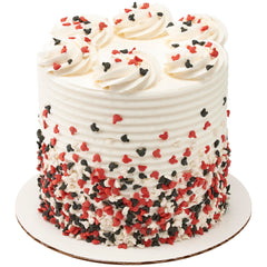 Mickey quins on cupcakes and cookies add bold color.