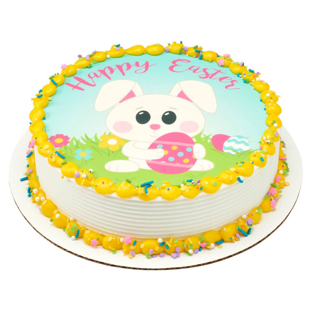 Pink flower shapes and white nonpareils stand out on desserts.