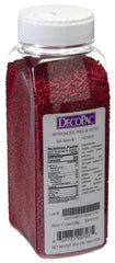 DecoPac Red Sprinkles on a cake for vibrant celebration color.
