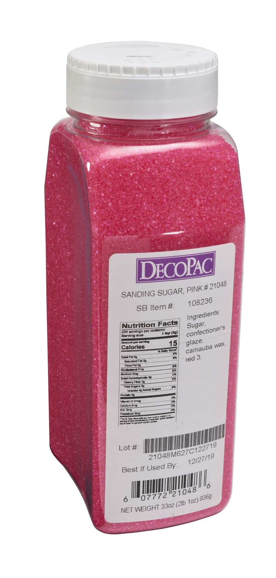 Close-up of pink DecoPac sanding sugar crystals ready to top cupcakes