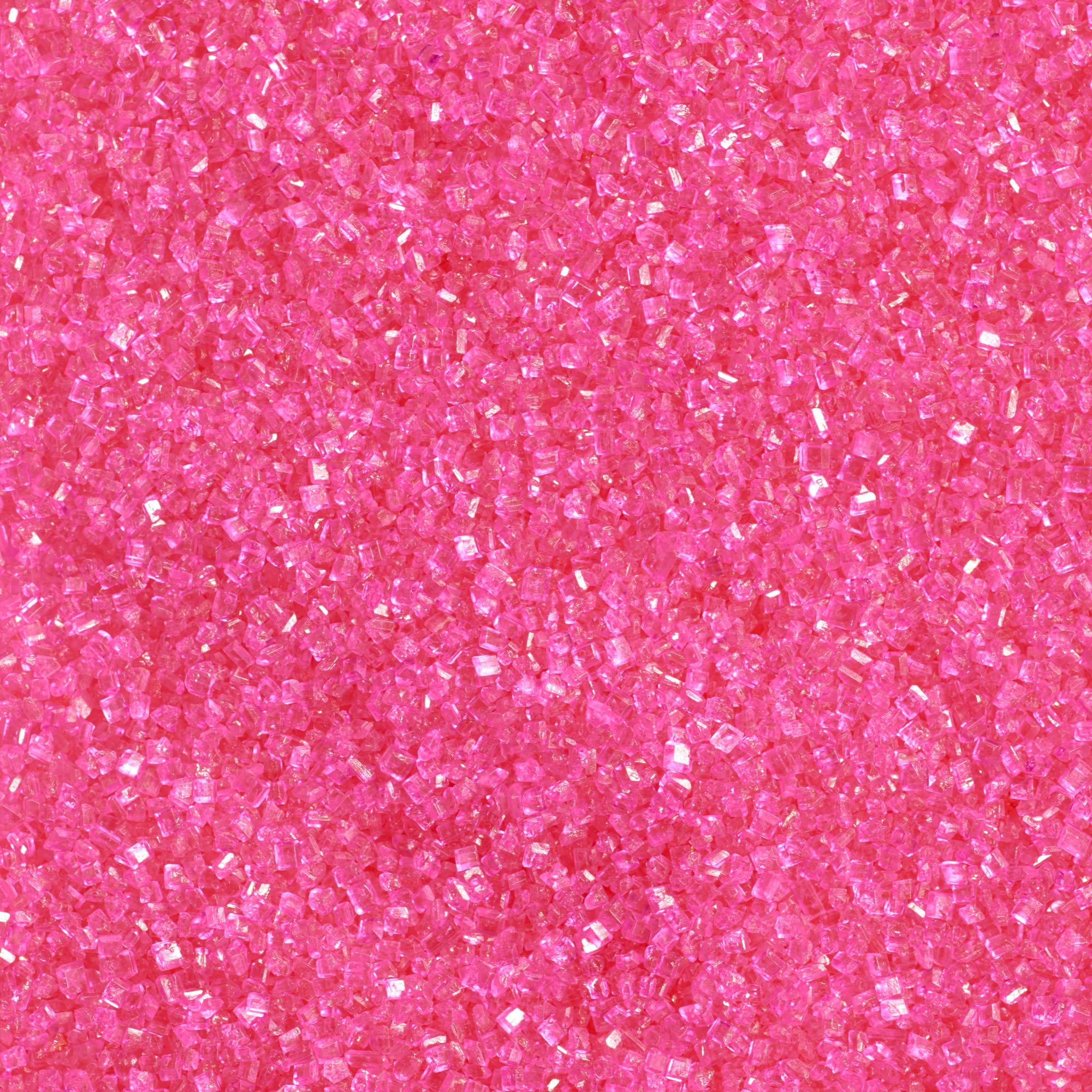DecoPac Pink Sanding Sugar in a handheld jar adds sparkle to cakes