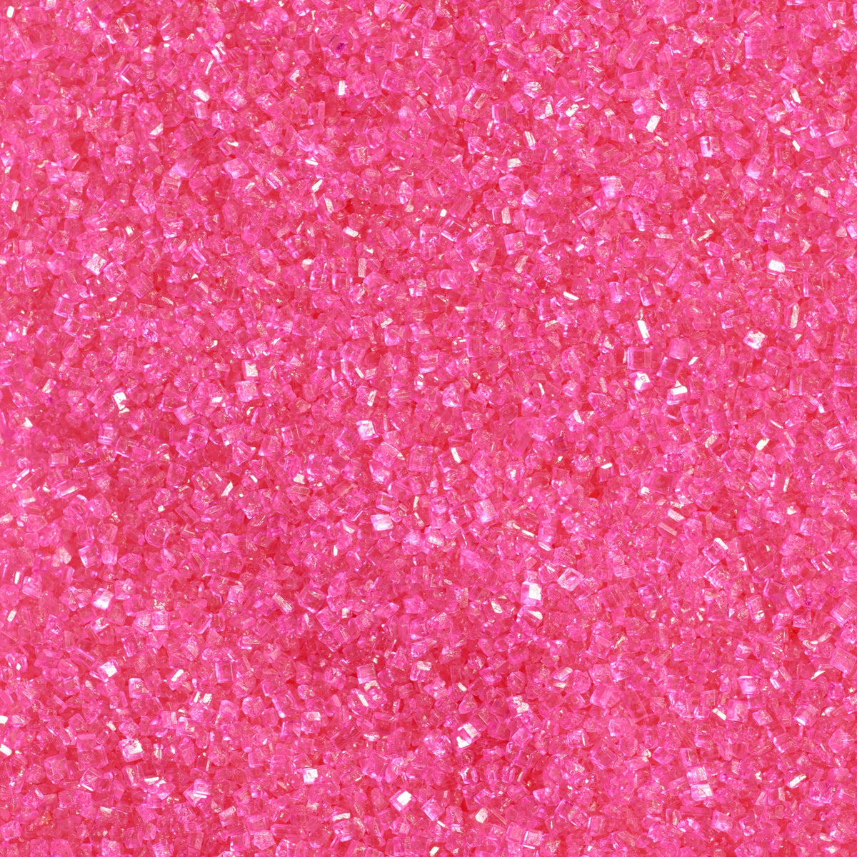 DecoPac Pink Sanding Sugar in a handheld jar adds sparkle to cakes