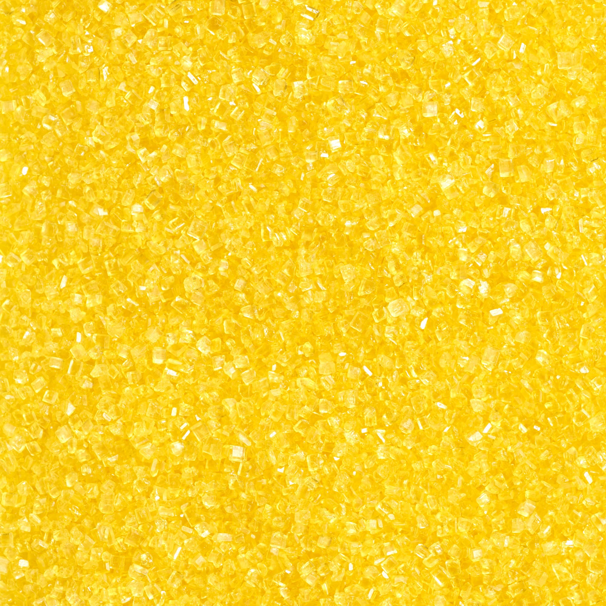 DecoPac yellow sanding sugar in handheld container for quick decorating.