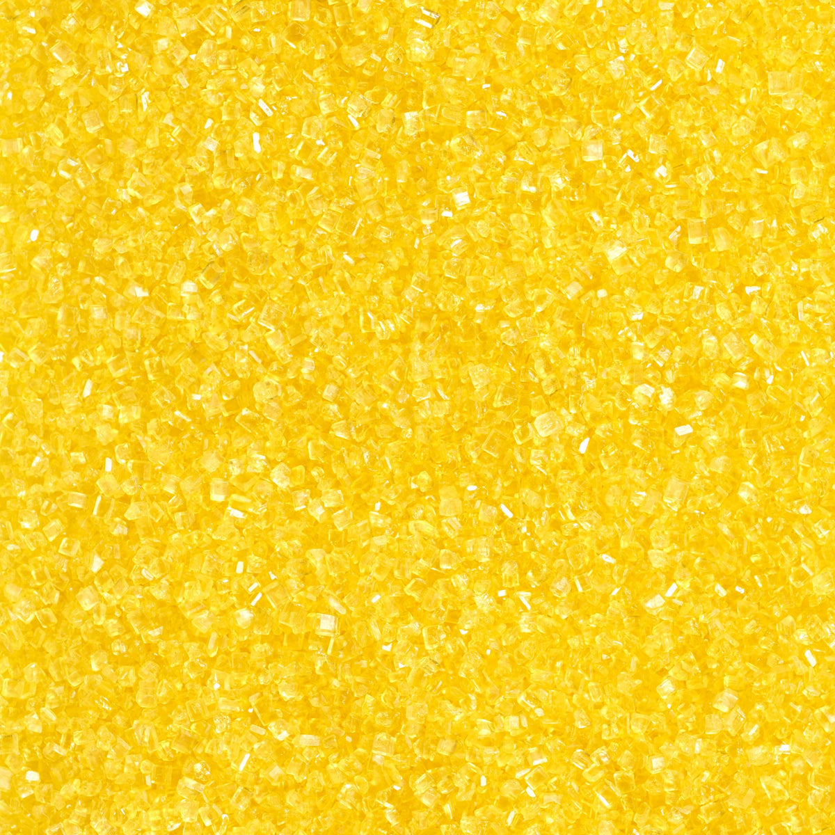 DecoPac yellow sanding sugar in handheld container for quick decorating.