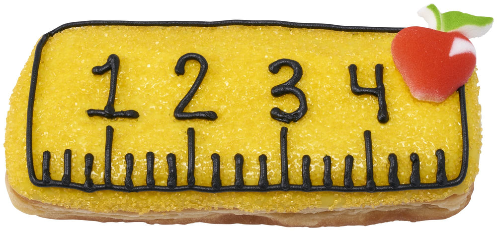 Scoop of ice cream topped with DecoPac yellow sugar sparkle.