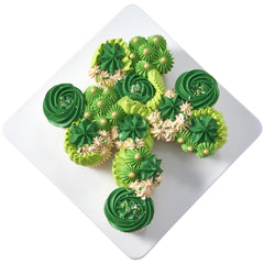 Cupcakes topped with DecoPac greens and whites for vibrant color.