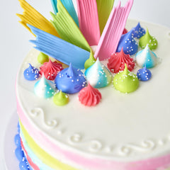 Cupcakes topped with DecoPac white nonpareils for a clean finish