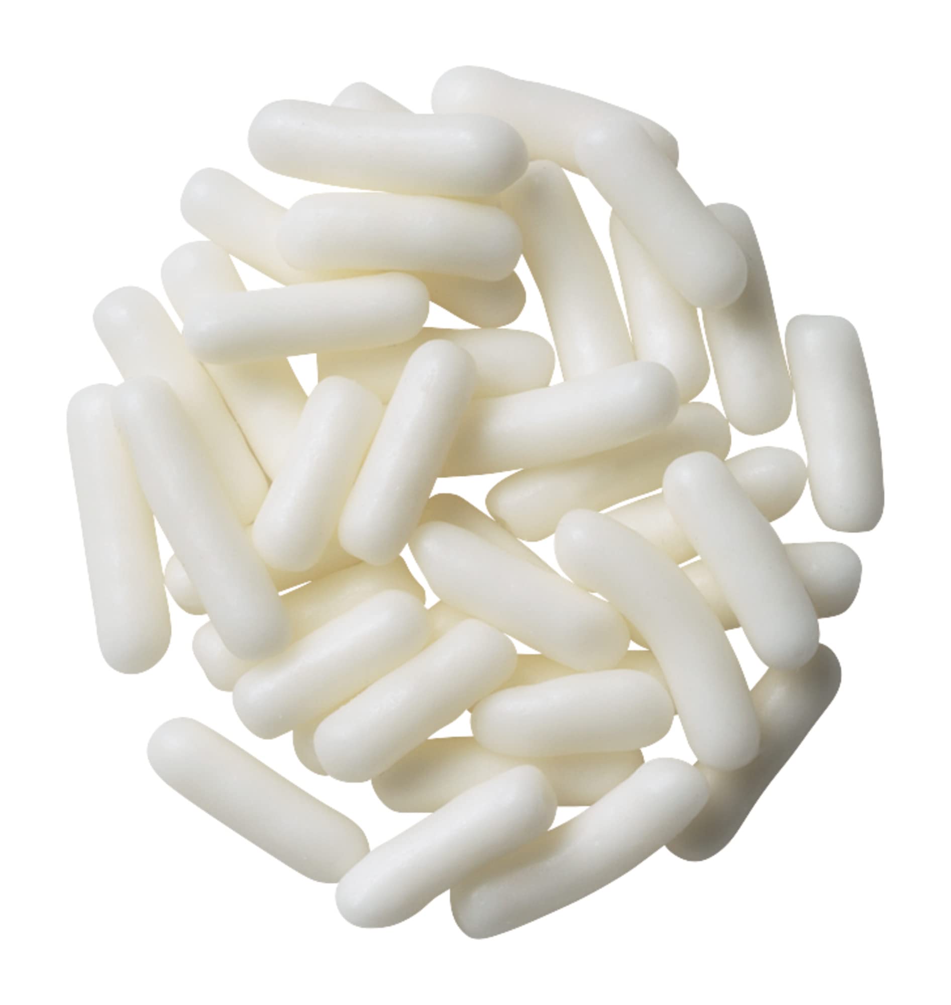 DecoPac white sprinkles topping a frosted cake for festive decoration.