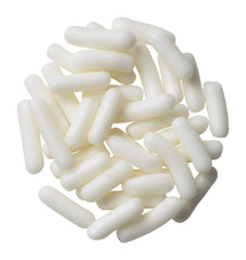 DecoPac white sprinkles topping a frosted cake for festive decoration.