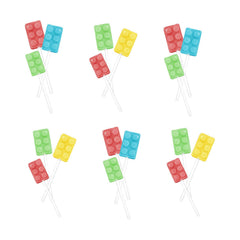 Dee Best Bricks On Stix party guests enjoying colorful lollipops