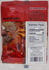 Deep Black Salt sprinkled on a plated dish for a rich finish.