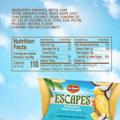 Pineapple chunks in pina colada syrup inside a Del Monte Escapes cup.