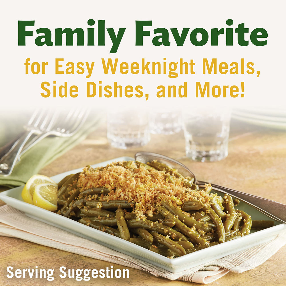 Canned greens served alongside chicken, a versatile side option.