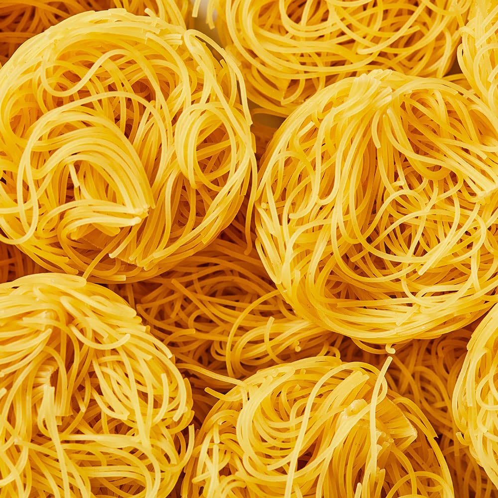 DeLallo Capellini nests in a bowl with lemon butter, ideal for light sauces.