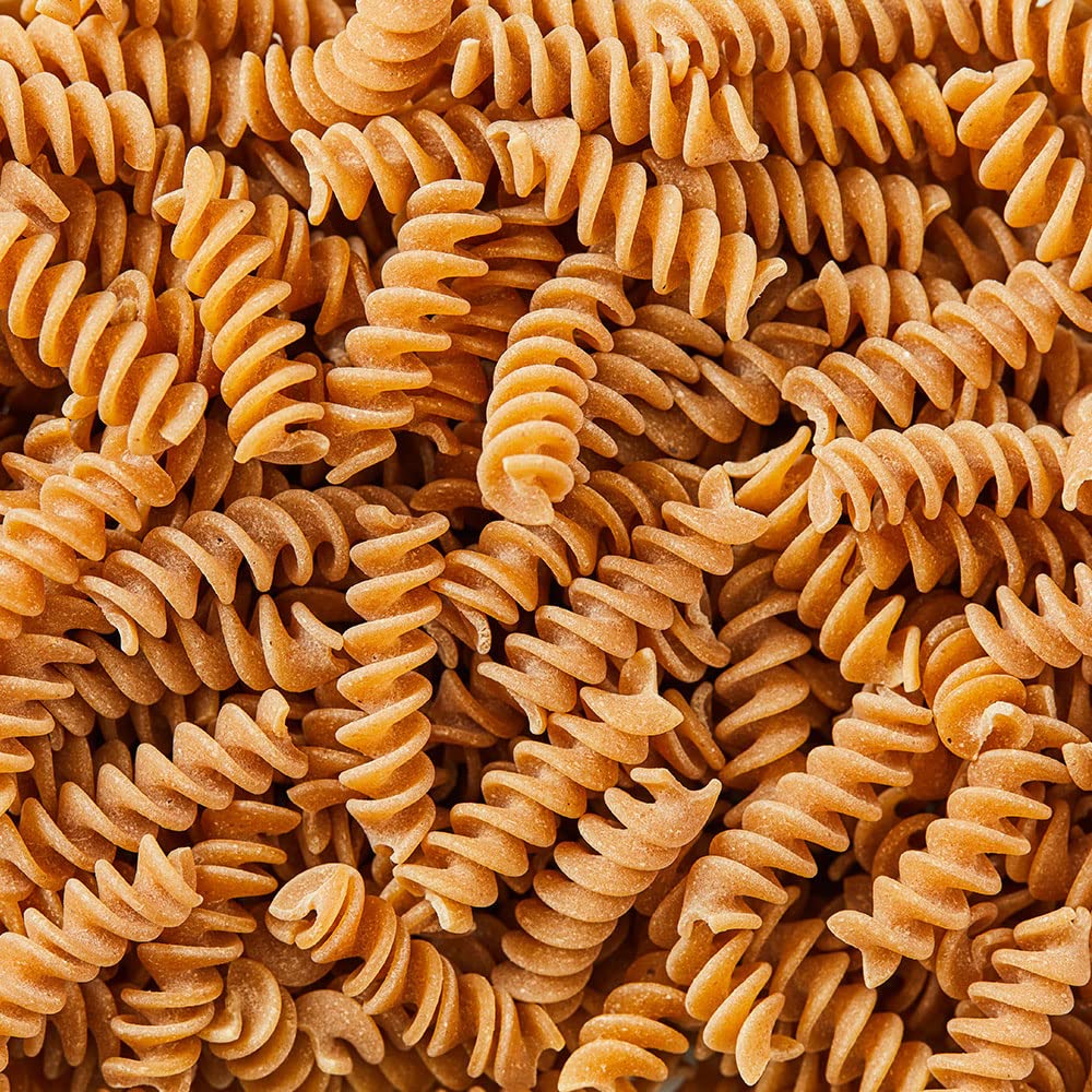 Cooked DeLallo Whole Wheat Fusilli #27 plated with sauce.