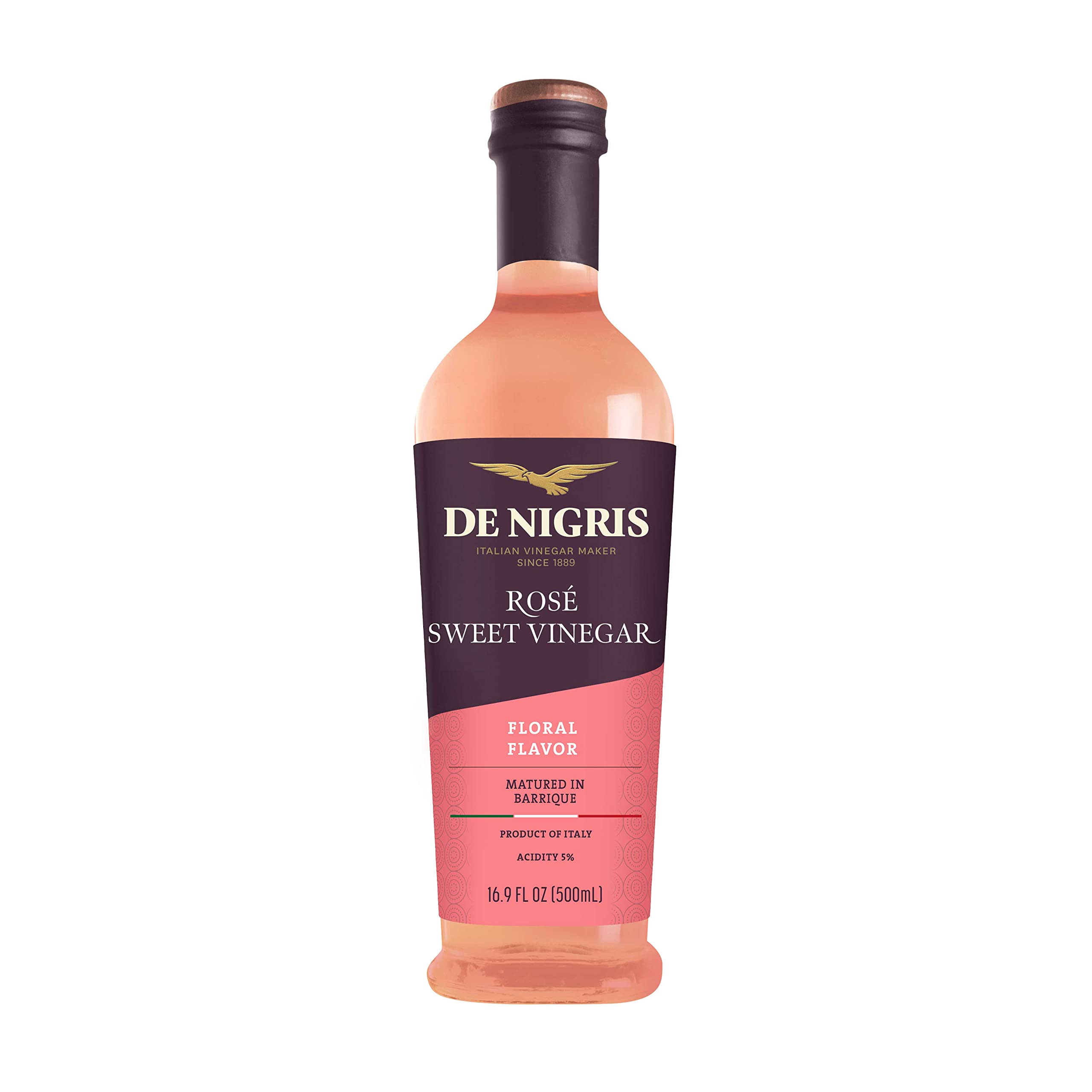 De Nigris Sweet Rosé Wine Vinegar bottle pour, ideal for fresh dressings.
