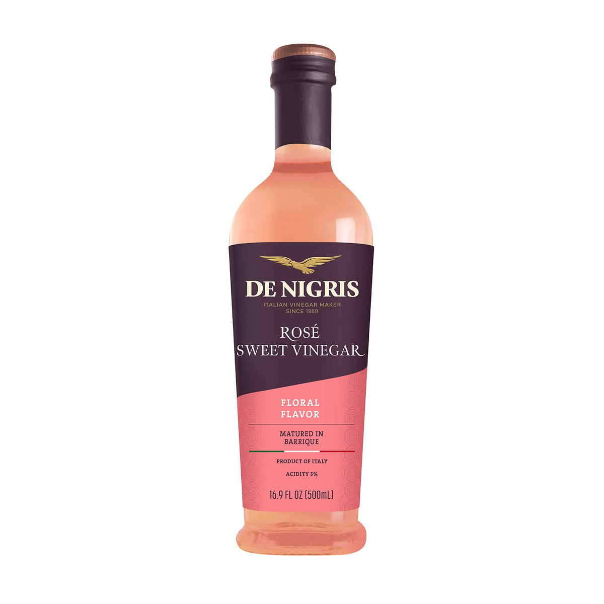 De Nigris Sweet Rosé Wine Vinegar bottle pour, ideal for fresh dressings.