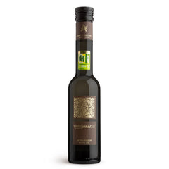 DESERTMIRACLE olive oil bottle pour showing a smooth finish for finishing dishes