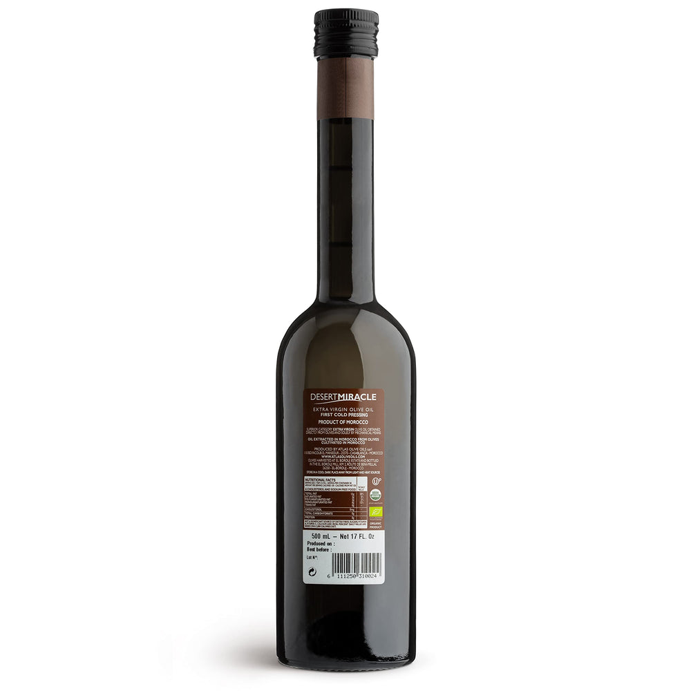 DESERTMIRACLE polyphenol-rich olive oil close-up highlights vibrant color and antioxidant character.