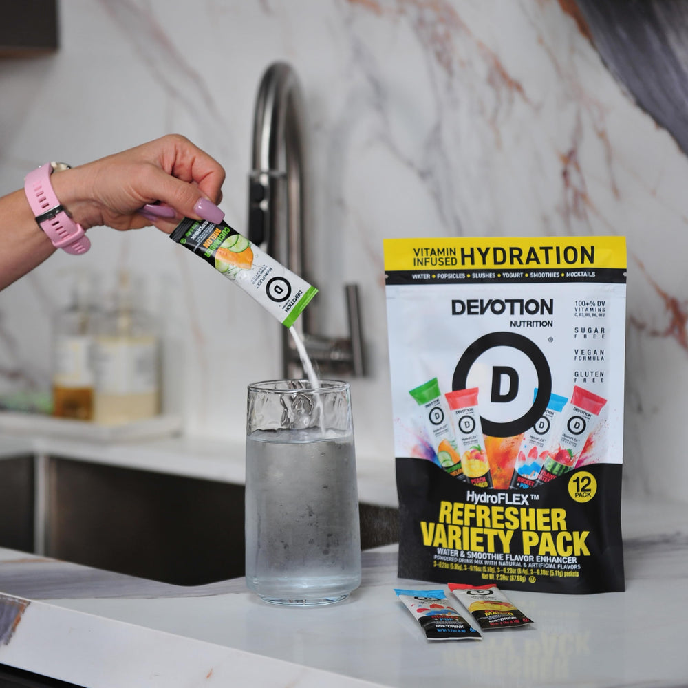 Devotion HydroFLEX being stirred into a smoothie or beverage for versatile flavoring