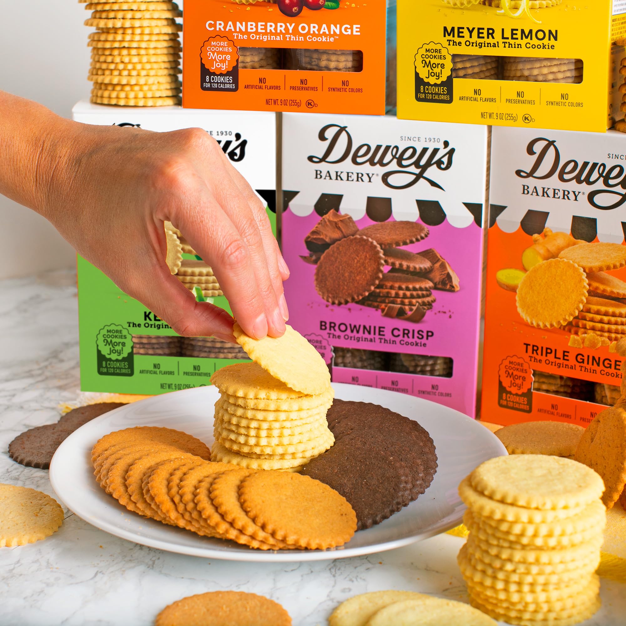 Dewey's Bakery Thins pack on counter with warm lighting.