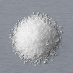 Diamond Crystal Kosher Salt shaker dispensing action on food