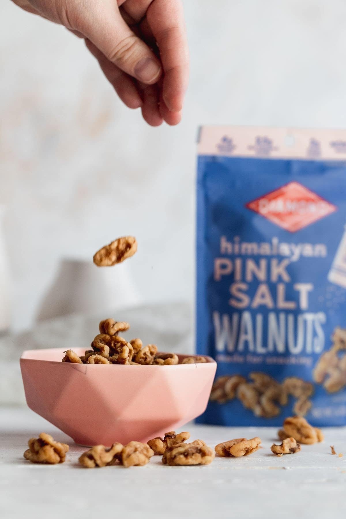 Diamond of California Himalayan Pink Salt Walnuts highlighting protein and omega-3 content.