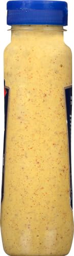 Dietz & Watson Spicy Brown Mustard on a burger patty as a topping.