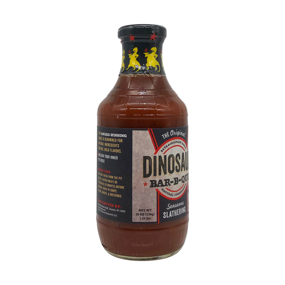 Dinosaur Sensuous Slathering BBQ Sauce on the grill with friends at sunset