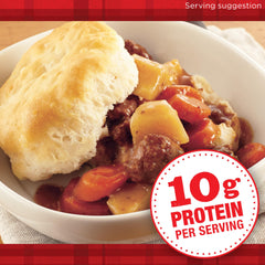 Serving bowl of DINTY MOORE Beef Stew with chunky meat pieces.