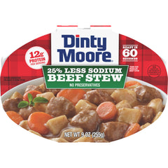 Dinty Moore less-sodium beef stew tray on shelf for quick meals.