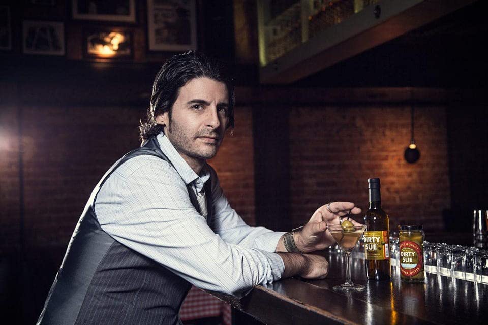 Bartenders favor Dirty Sue for consistent olive juice in cocktails.
