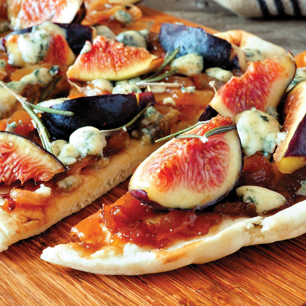 Divina caramelized onion jam beside brie tartlets adds depth.