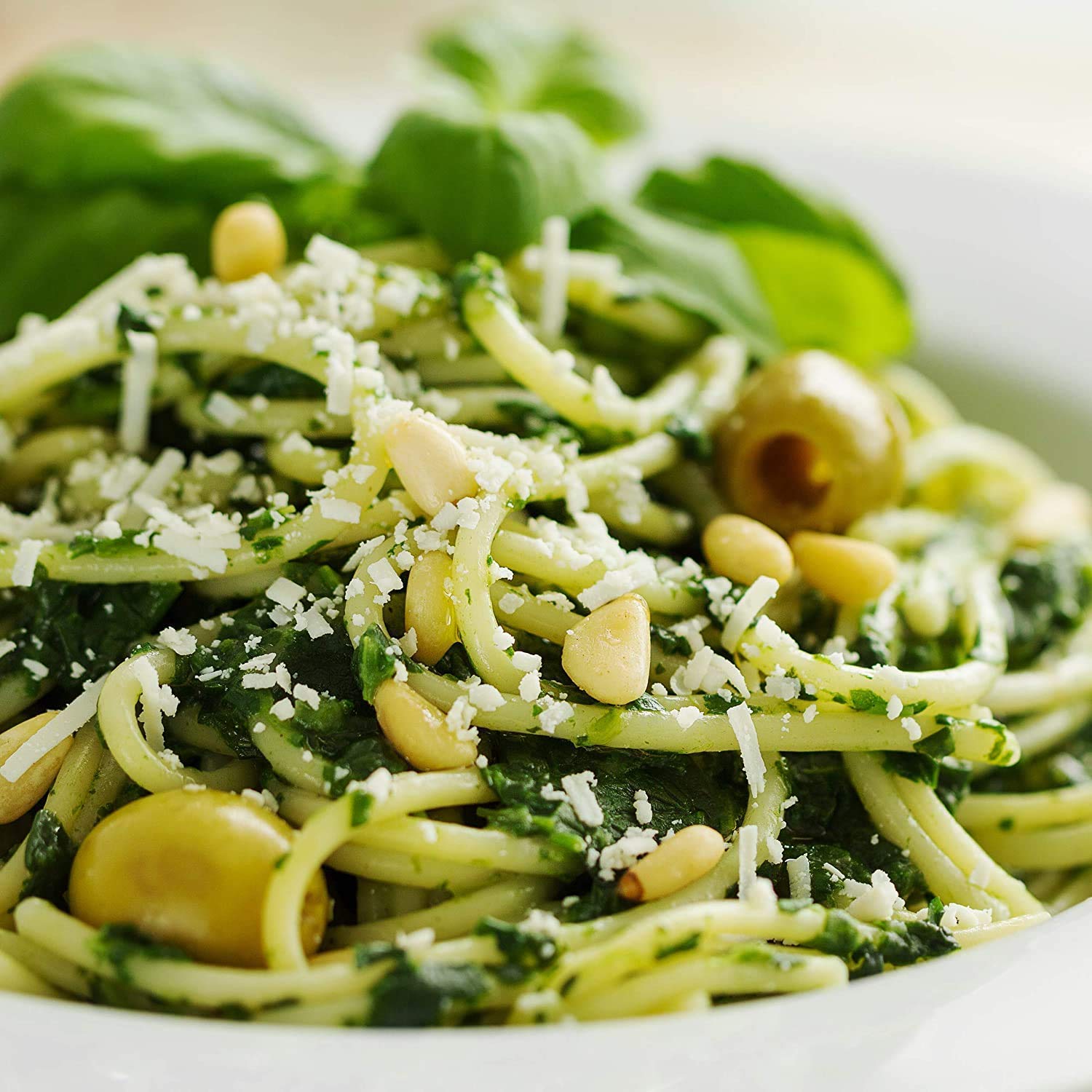 Divina green olives close-up shows glossy skin and fresh aroma.
