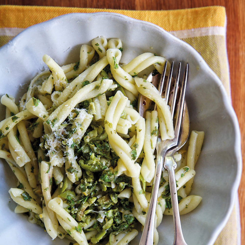Divina green olives with hummus for quick, savory snacks.