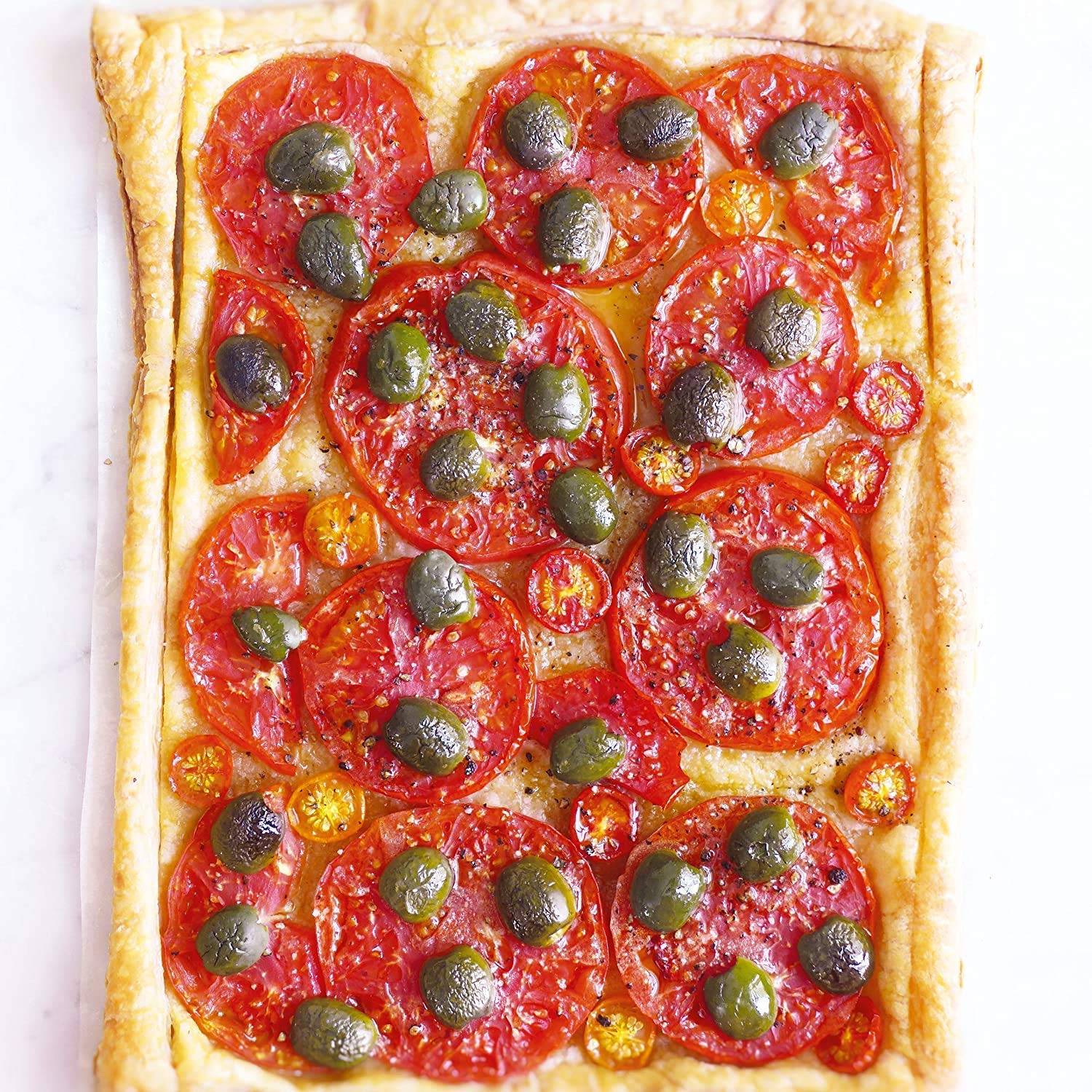 Divina olives on a brunch platter with cheese and veggies.