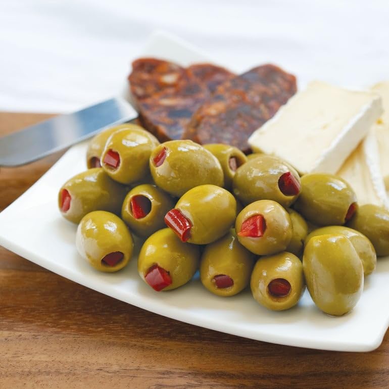 Divina olives stuffed with red pepper on an elegant antipasto platter.