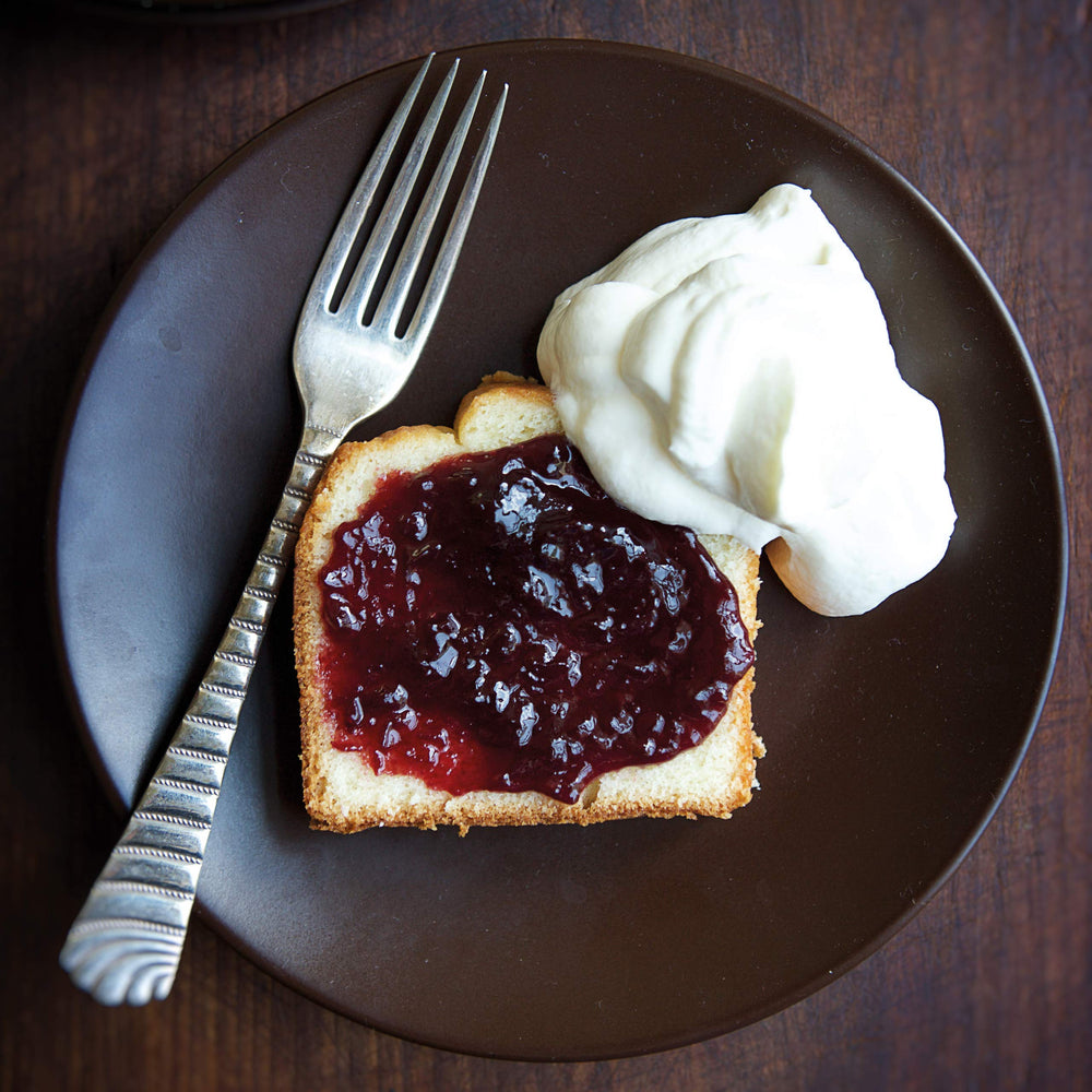 Divina sour cherry spread jam on toast, a vibrant breakfast option.