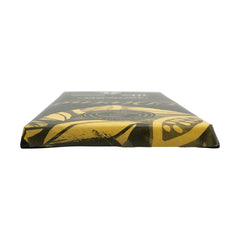 DIVINE CHOCOLATE bar edge with cocoa dust conveys richness.