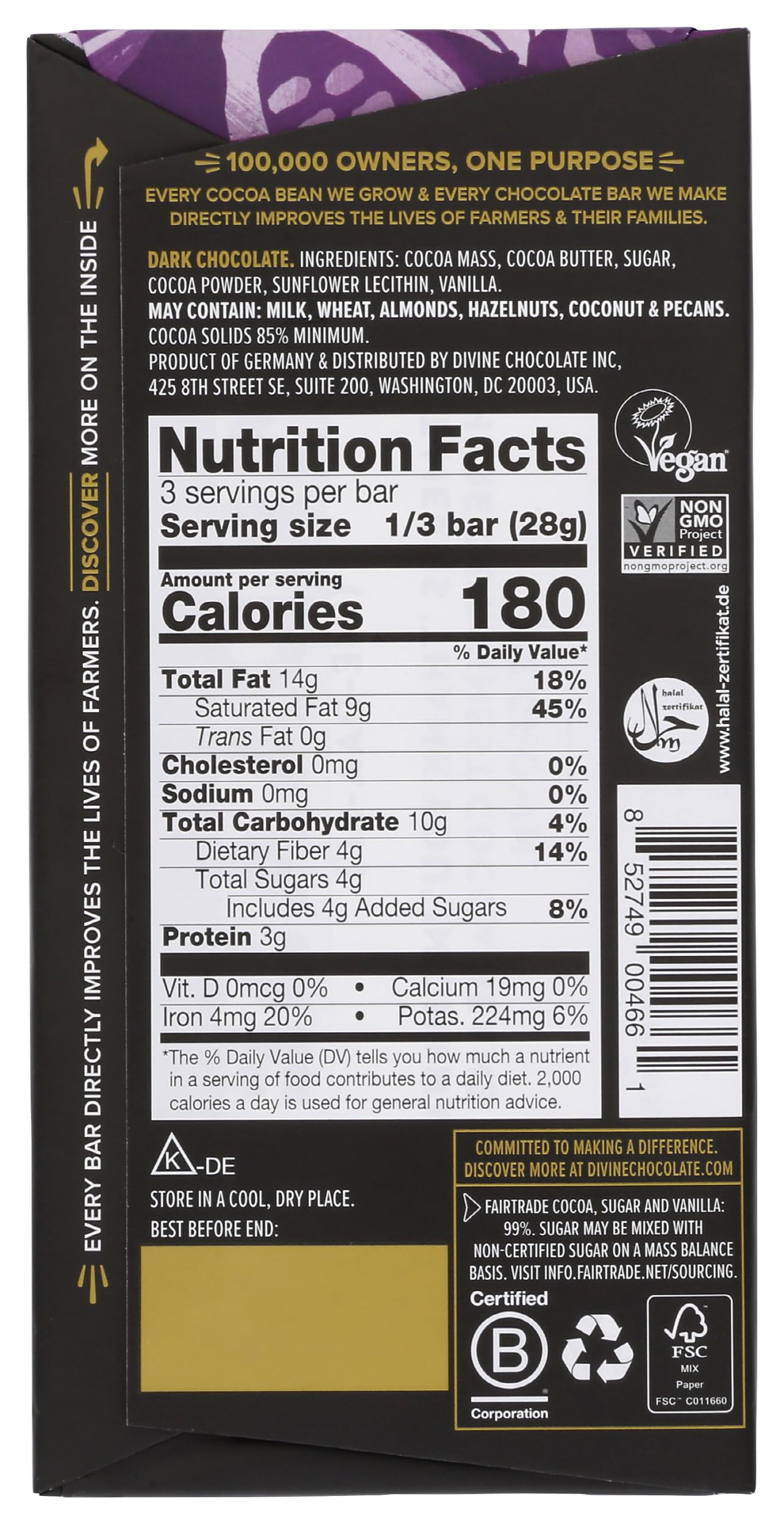 Divine Chocolate 85 percent dark bar slice reveals velvety interior and deep cocoa.