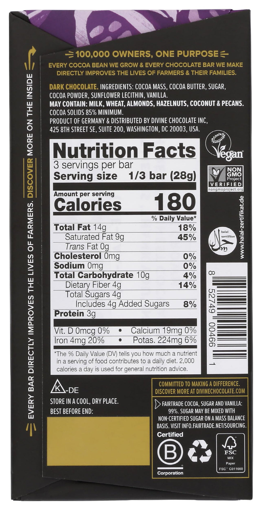 Divine Chocolate 85 percent dark bar slice reveals velvety interior and deep cocoa.