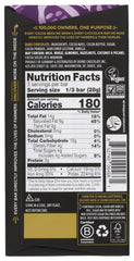 Divine Chocolate 85 percent dark bar slice reveals velvety interior and deep cocoa.