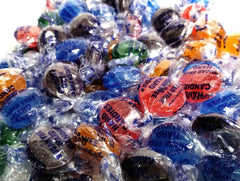 DM Sweets assorted sugar-free fruit candy-buttons for guilt-free snacking.
